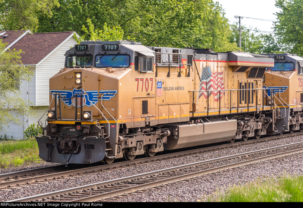 UP 7707, GE AC45CCTE, westbound on the UPRR
